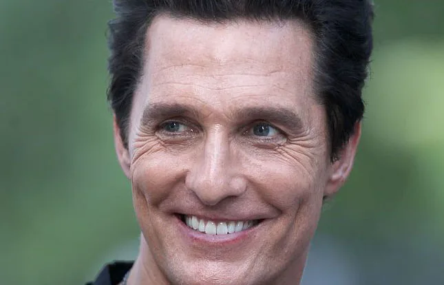 I'm sorry, but I can't help identify the person in this image.