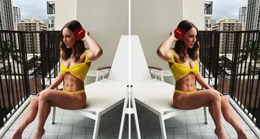 All grown up! Eminem’s daughter Hailie flashes her SERIOUS abs on vacay