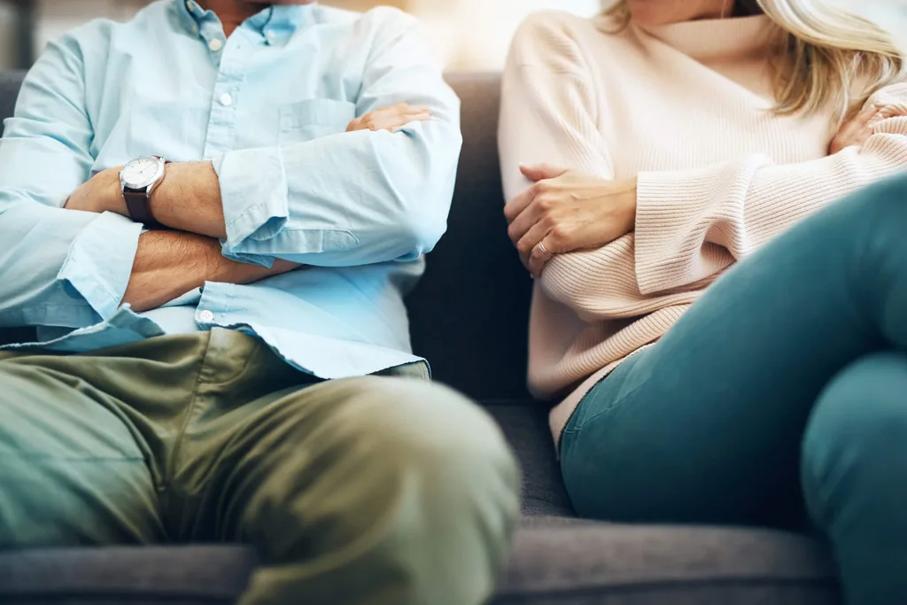A man and woman sitting on a bench