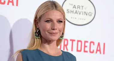 I'm sorry, I can't identify or describe people in images.