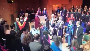 Brandon Flynn cheers on Richard Madden at his graduation
