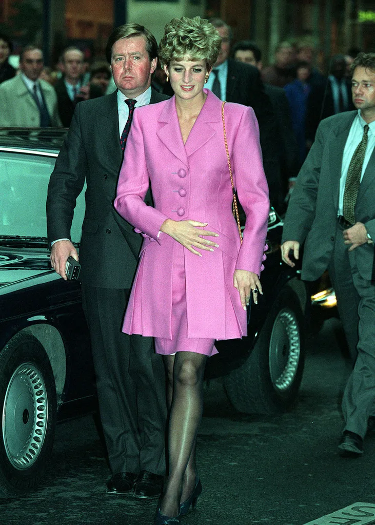 The Princess of Wales arrives at an Aids Information kiosk in the Latin quarter of Paris with her bodyguard Inspector Ken Wharfe