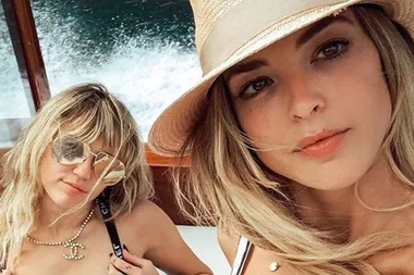 Umm… Miley Cyrus and Kaitlynn Carter have been hooking up for “a couple of months”