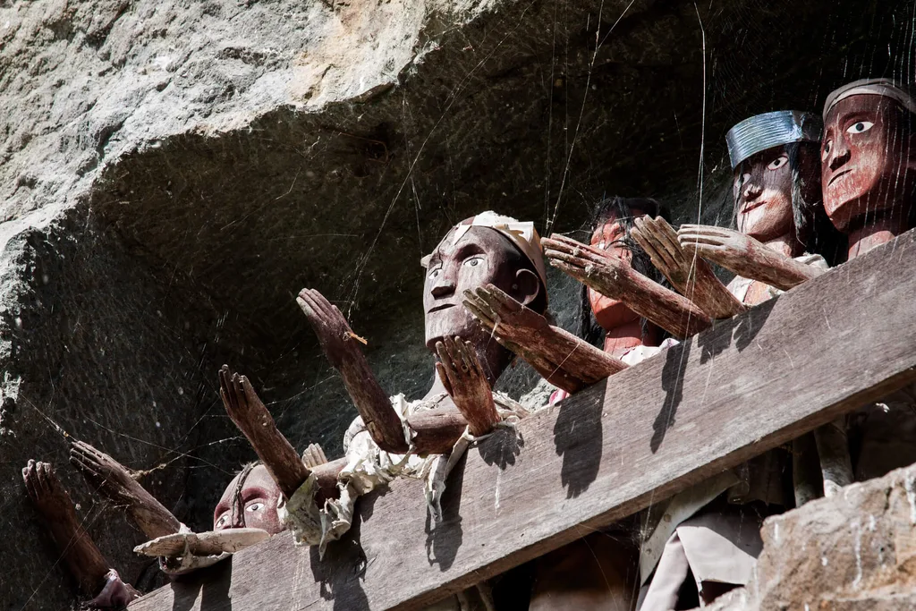 Traditional Torajan Wooden Effigies with outstretched hands