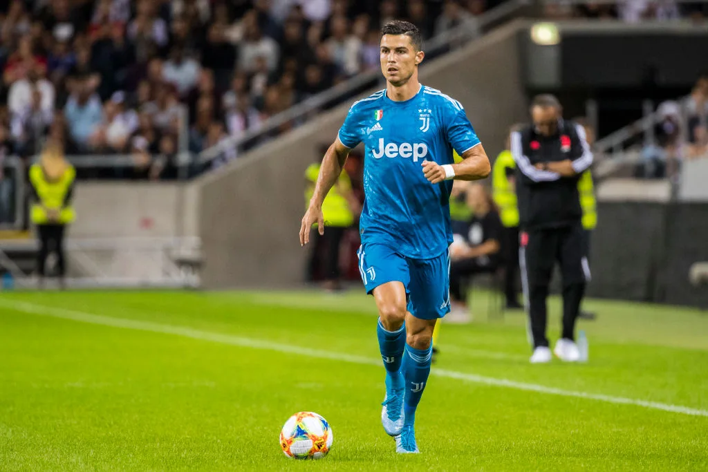 Cristiano Ronaldo in a blue jersey on the football field
