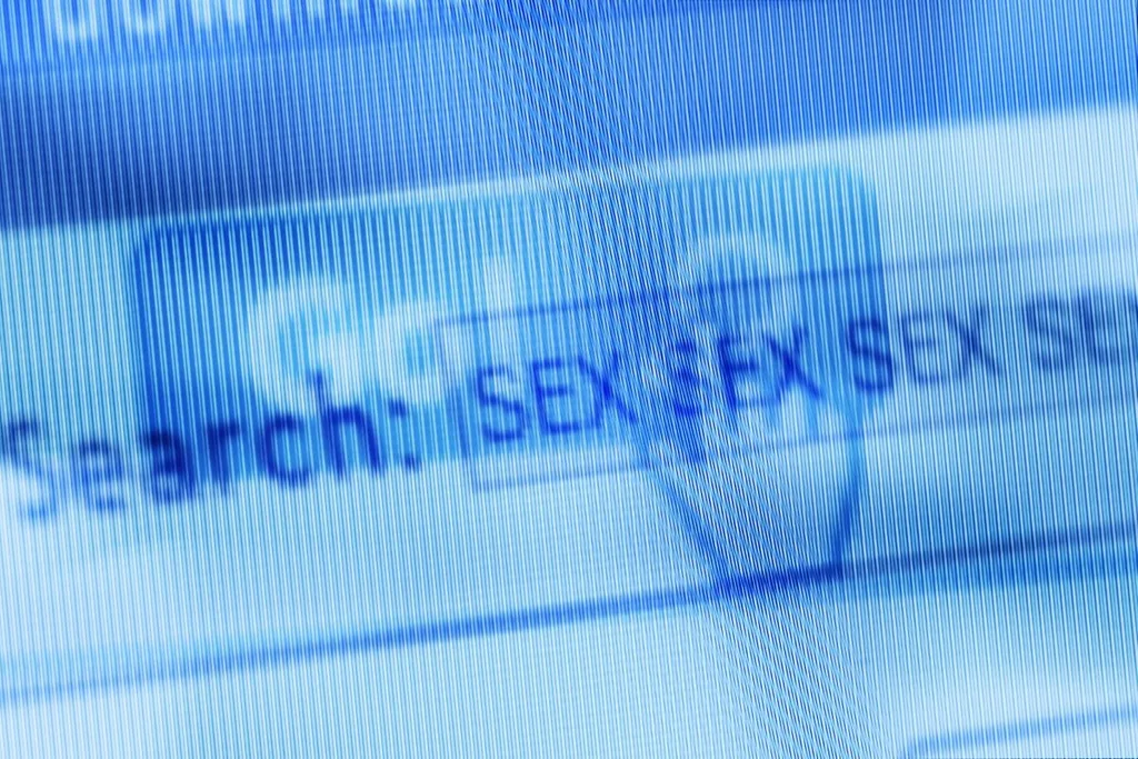 A web search bar showing 'SEX