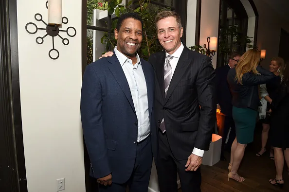 Patrick Whitesell with client Denzel Washington
