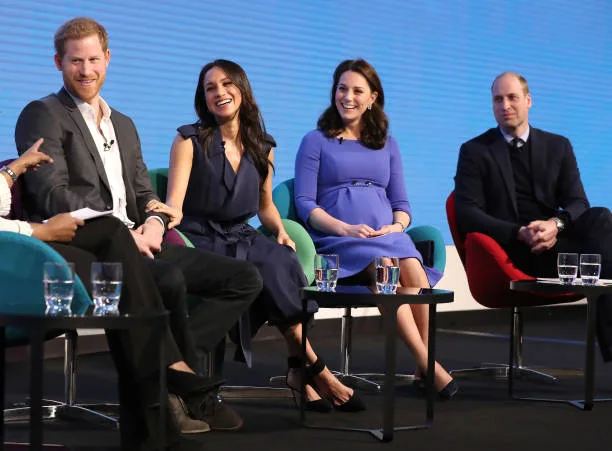 Meghan speaks at an event with Harry, WIlliam and Kate
