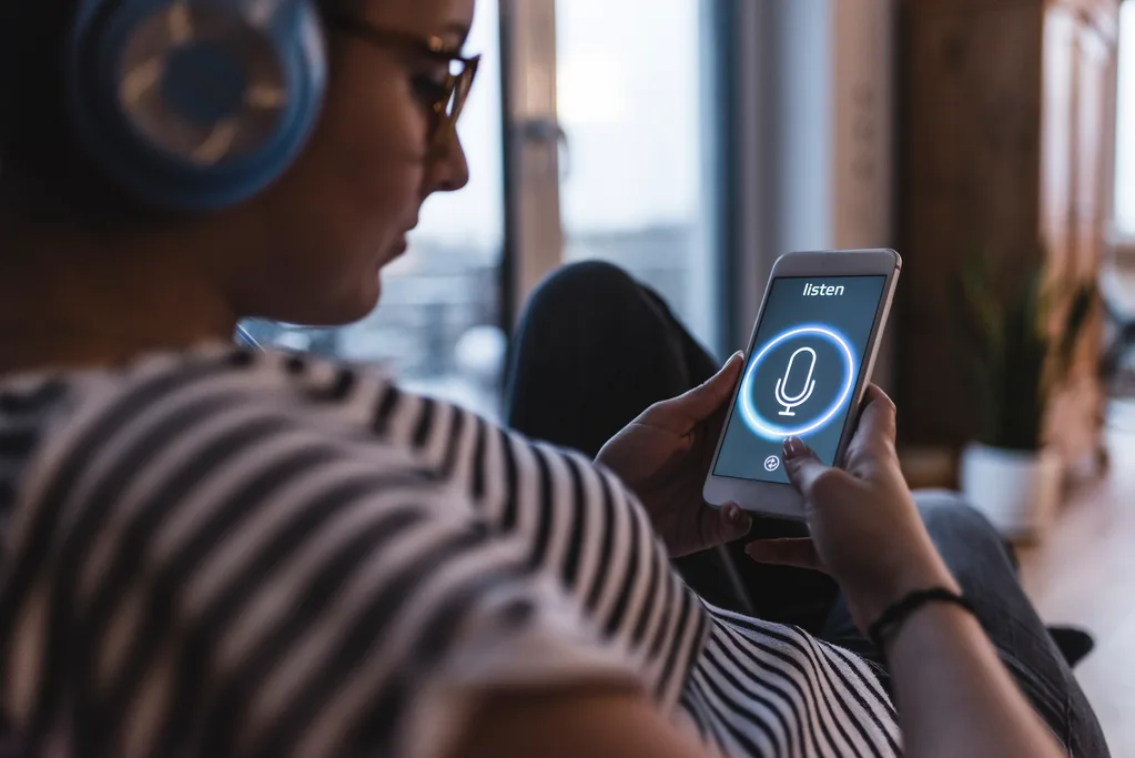 Woman listening to music on her Android phone