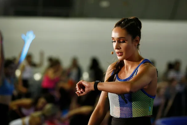 Kayla Itsines teaching a workout on day 1 of PopSugar