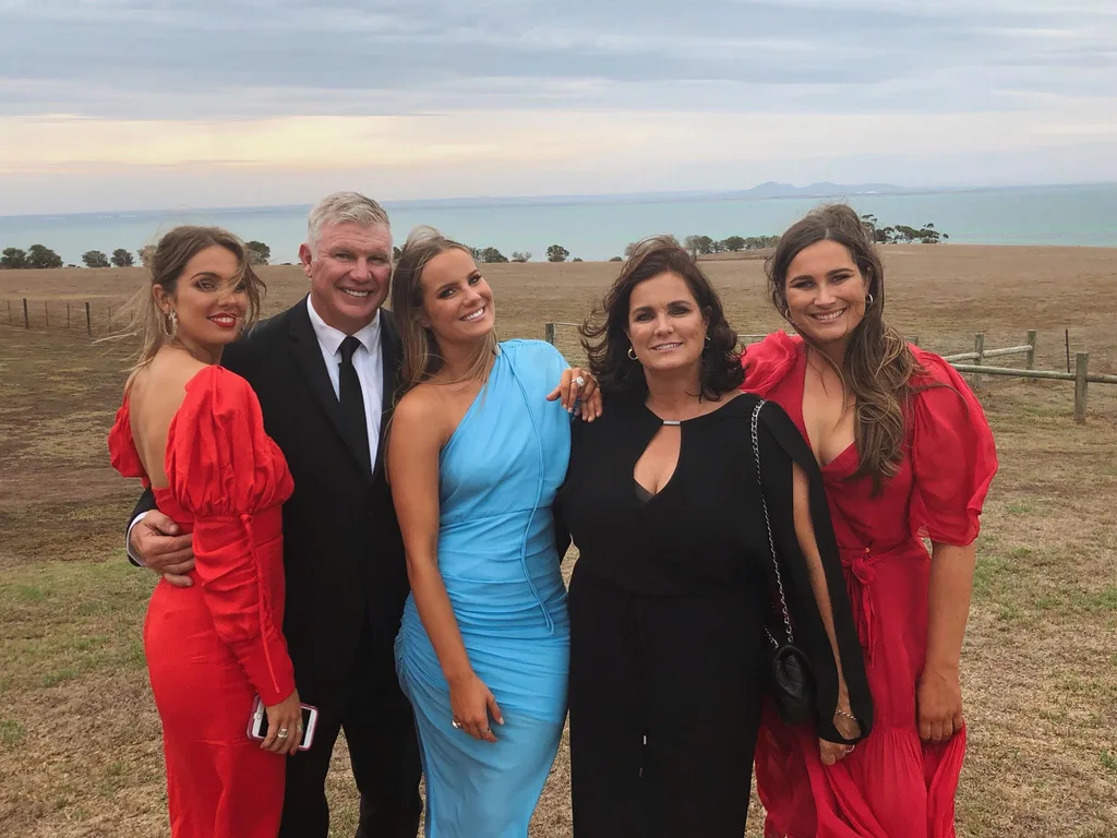 Danny Frawley with his wife and family