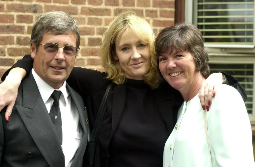 J K Rowling with her father and step-mother after receiving her an honorary Doctor of Letters degree