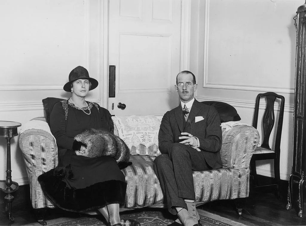 Prince Andrew & Princess Alice sitting on a couch