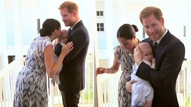 Prince Harry cradles baby Archie in tender scenes