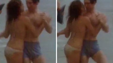 Prince Charles caught getting cheeky kiss from Aussie model