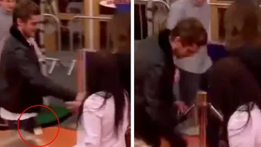 Zac Efron drops a CONDOM on the red carpet