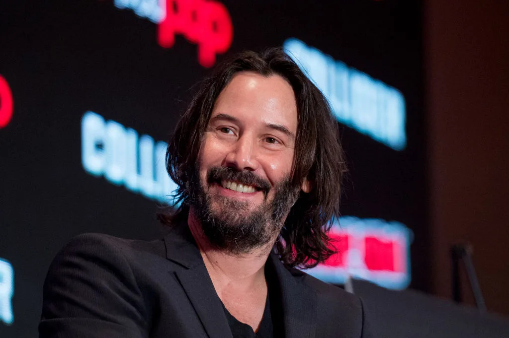 Keanu Reeves answering questions on the panel of the 2017 New York Comic Con