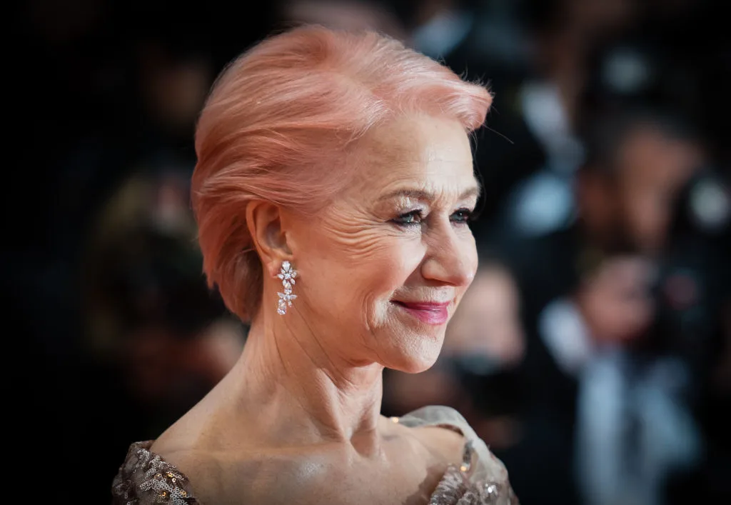 Dame Helen Mirren pictured with baby pink hair on the red carpet at The 72nd Annual Cannes Film Festival