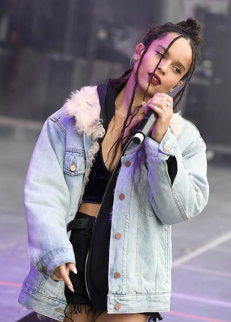 LOLAWOLF wearing a hooded fur denim jacket with shorts at the The Meadows Music & Arts Festival