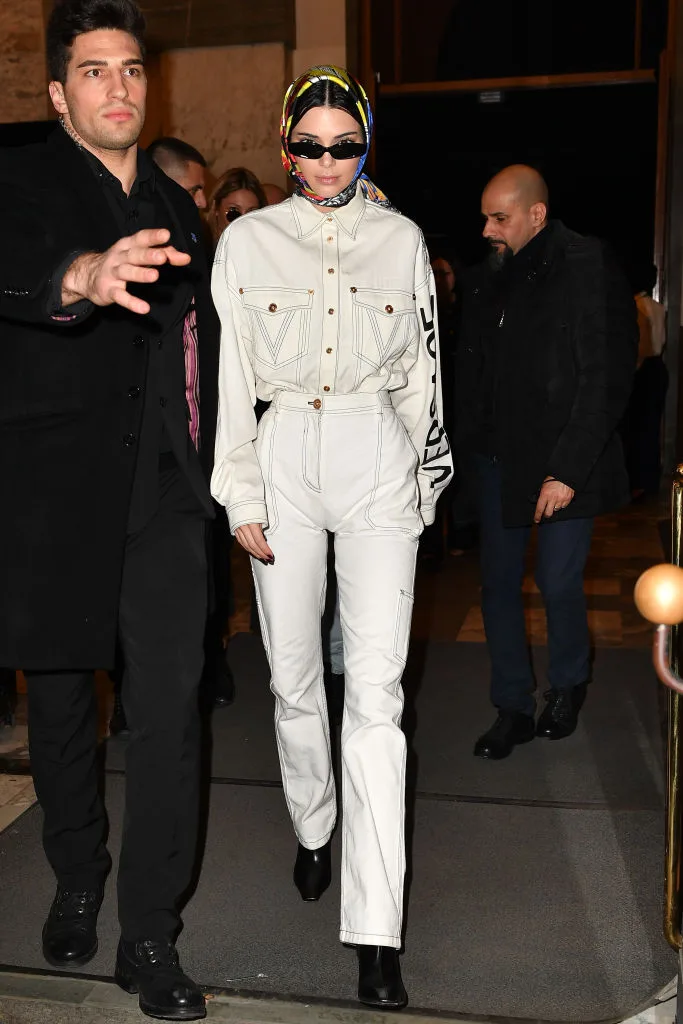 Kendall Jenner In A Scarf wearing a white denim outfit with a scarf