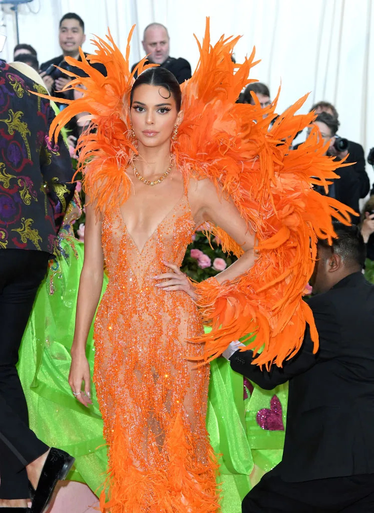 Kendall Jenner wearing an orange fluffy dress at the 2019 Met Gala