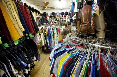 A woman shopping at an op shop