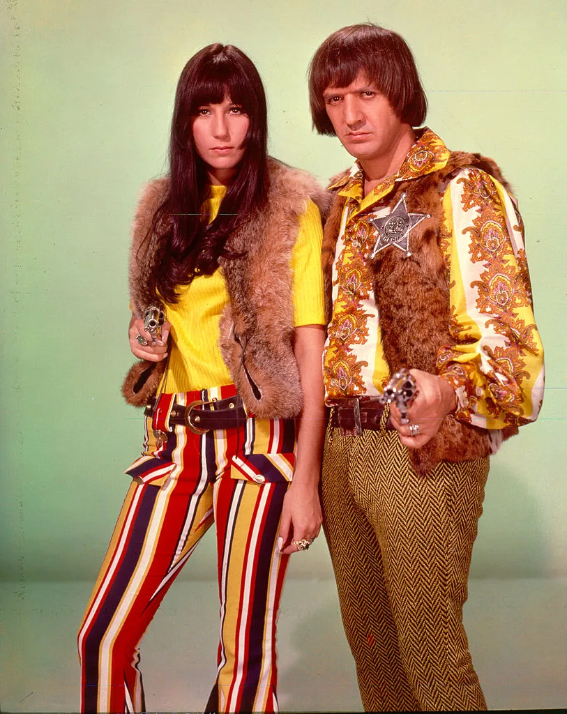 Sonny Bono & Cher posing for a portrait
