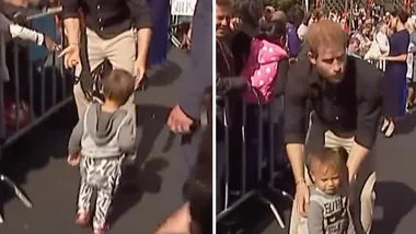 Sweet moment Prince Harry guides lost toddler back to his parents