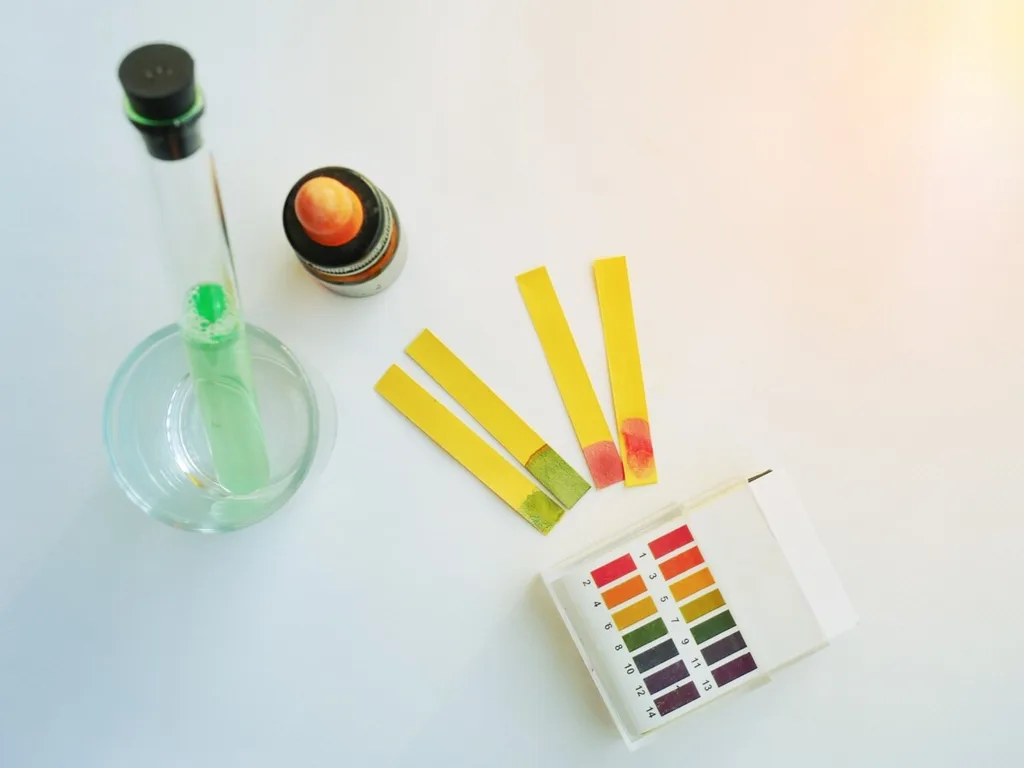 A PH test kit on a white table