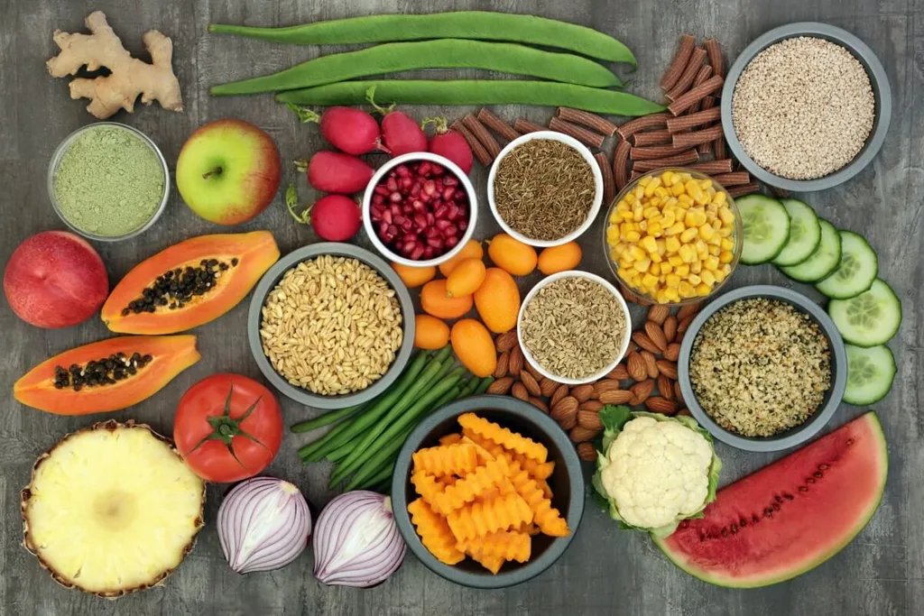 A top-view photo of alkaline foods on a stone bench