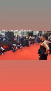 Ada Nicodemou and Adam Rigby cuddle up at the AACTA Awards