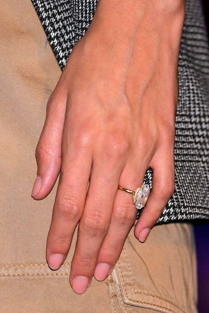 A close up of Hailey Baldwin's hand showing off her new engagement ring