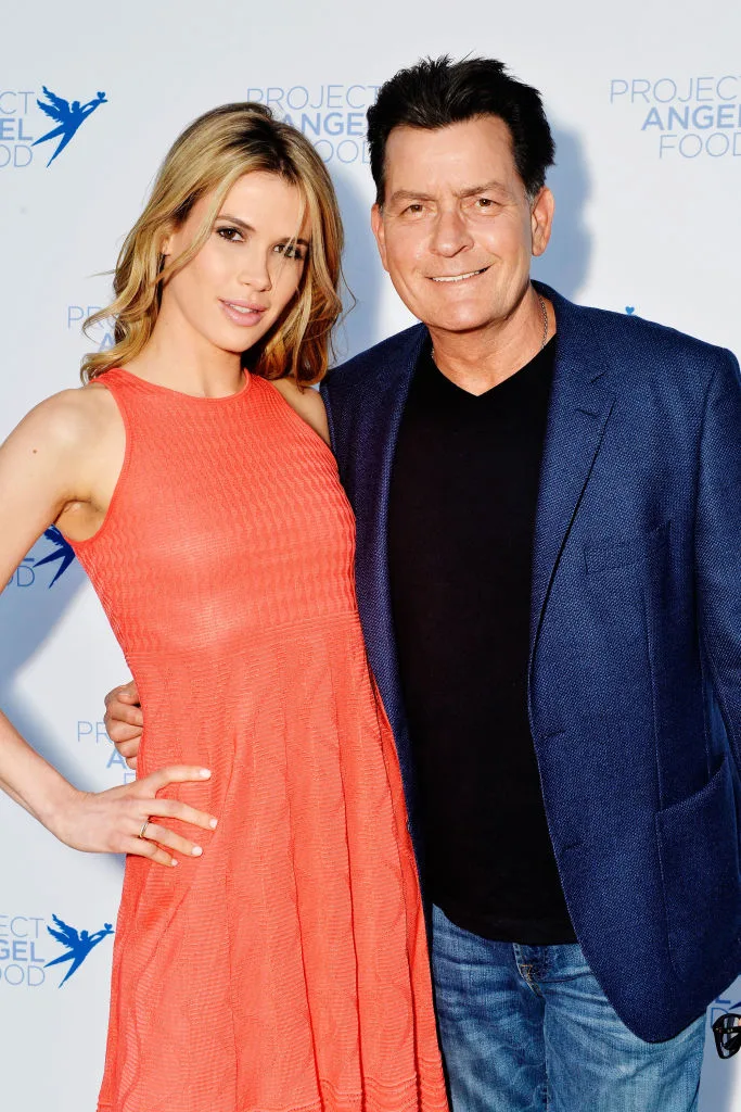 Julia Stambler and Charlie Sheen posing together at the Project Angel's Benefit Auction