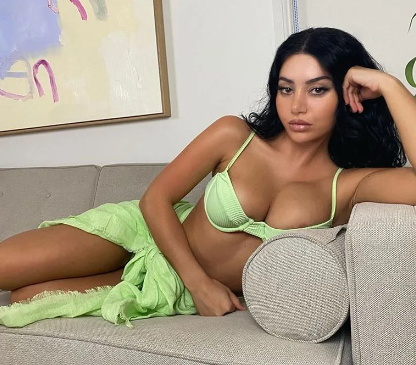 Married At First Sight star Martha Kalifatidis shares a nip slip in tiny green bikini