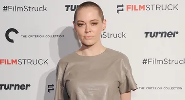 Woman with buzz cut at event with FilmStruck and Criterion Collection logos on the background wall.