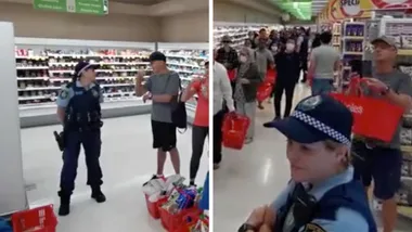Police guard toilet roll as customers queue to get theirs hands on some