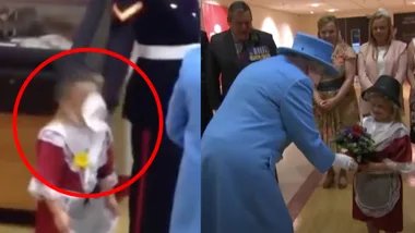 Little girl hit in the face by soldier after meeting the Queen