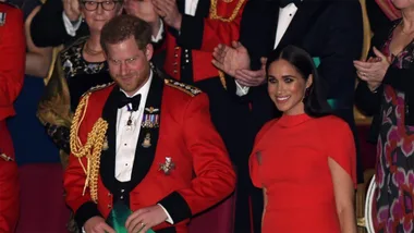 Meghan & Harry beam as crowd cheer in one of their last royal events