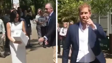 Prince Harry jokingly scolds fan for giving Meghan a bunch of flowers
