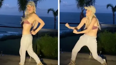Sophie Monk shows off her toned abs as she dances to NSYNC