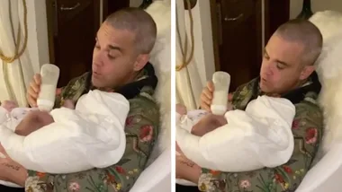WATCH: Robbie Williams sweetly sings as he feeds newborn son Beau