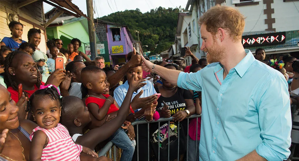 Prince Harry meets members of the public on the sixth day of an official visit on November 25, 2016 in Soufriere, Saint Lucia.