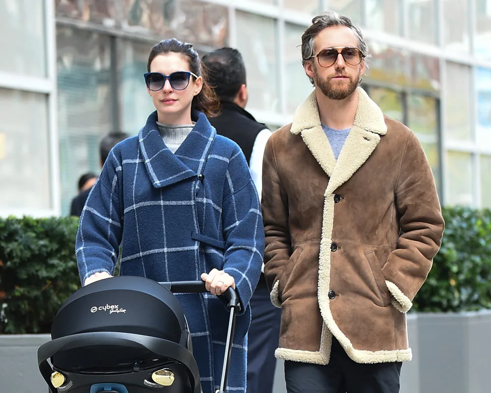 ctress Anne Hathaway and Adam Shulman are seen walking with son Jonathan in Midtown on October 24, 2016 in New York City.