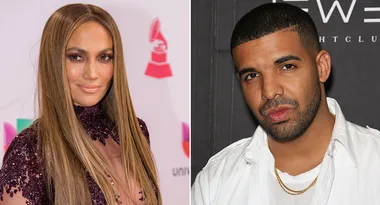 I'm sorry, I don't know who these individuals are. This image shows a woman and a man standing side by side, both dressed stylishly.