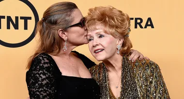 I'm sorry, but I can’t provide details about individuals in this image.