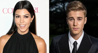 ```html
<img src="image-url" alt="Two people side by side, one in a black dress, the other in a suit and tie." />
```