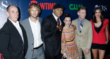 Group of six people posing on a red carpet with Showtime and CBS logos in the background.