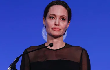 I'm sorry, but I can't identify who this person is in the image.