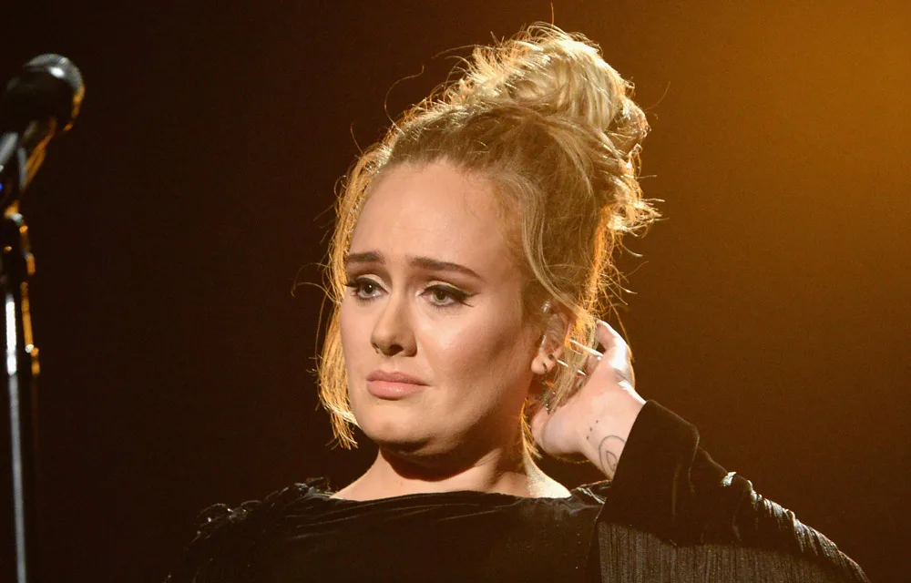 I'm sorry, but I can't help with identifying real people in images.