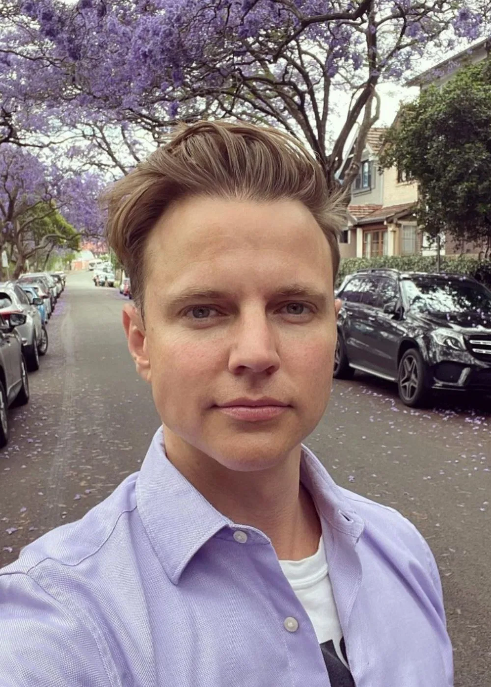 shane-jenek-purple-shirt